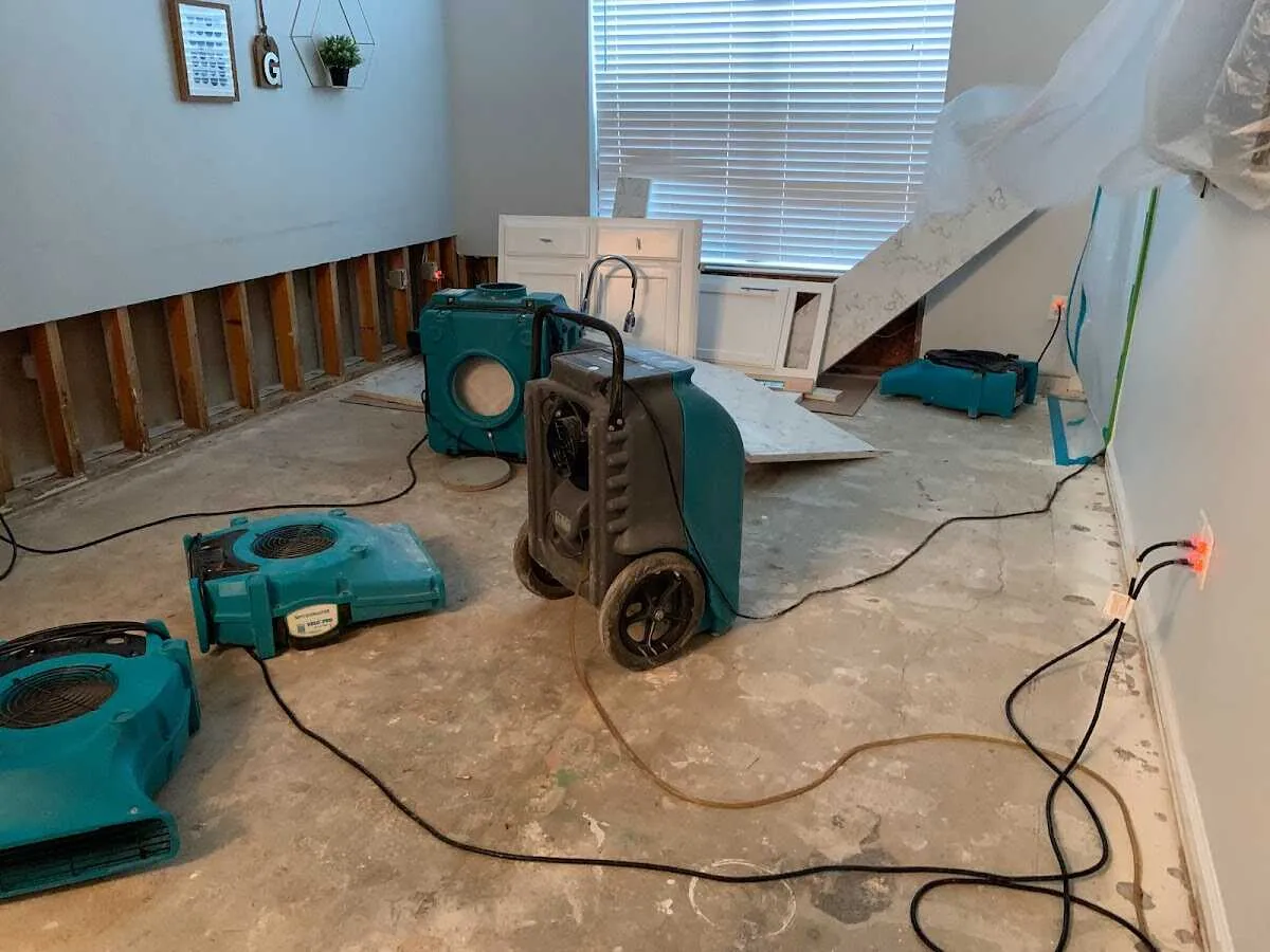 Dehumidifier in flood-cut room for Water Damage Restoration in Norton Shores